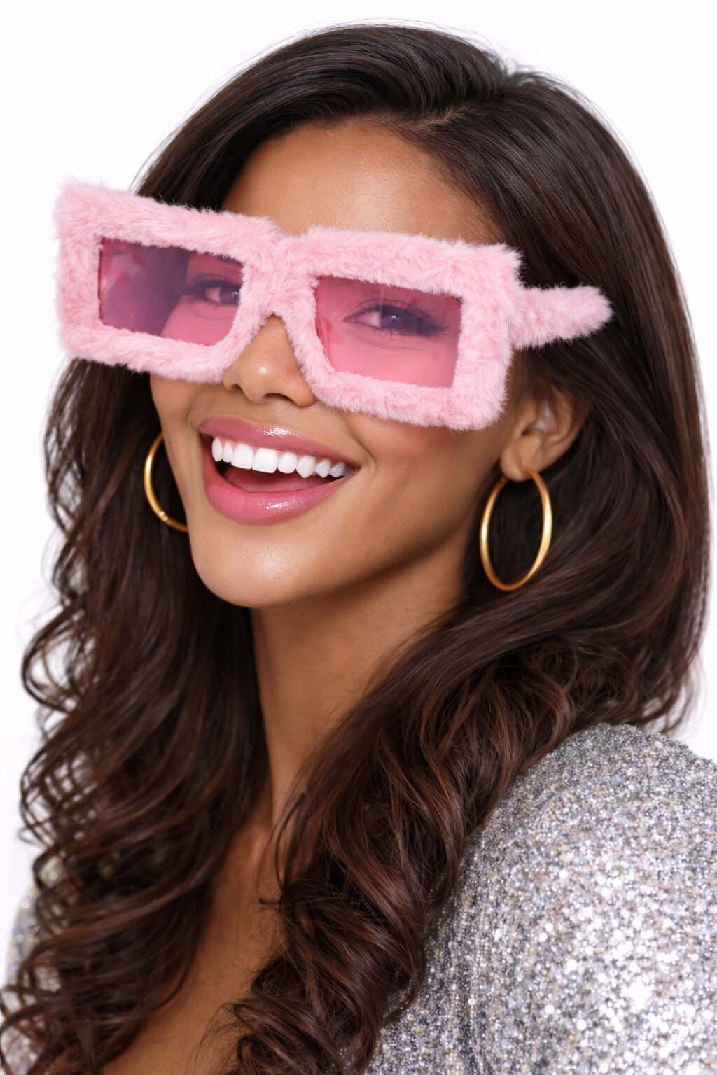 A woman wearing Light Pink Furry Glasses, smiling, showcasing a fun party look with fluffy square frames.