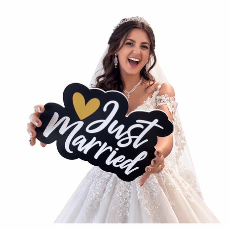 Bride holding a 'Just Married' sign, perfect for Individual Photo Booth Props.