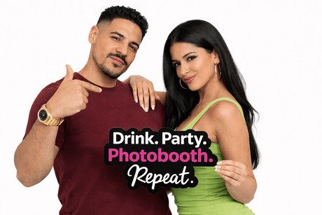 Drink.Party.Photobooth.Repeat Prop held by a couple, showcasing fun and vibrant party spirit.