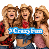 Three smiling women in cowboy hats holding a sign that says #CrazyFun, embodying joy and excitement.