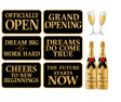 Grand Opening Oversized Five Piece Decor Kit For Launch Celebration And Photo Backdrop featuring elegant signage and champagne.