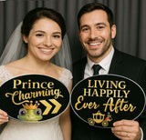 Fairytales/ Princess Party Prop Set featuring bride and groom holding whimsical signs, 'Prince Charming' and 'Living Happily Ever After'.