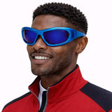 Man wearing Metallic Blue Disco Glasses with a smile, showcasing bold style for parties and events.