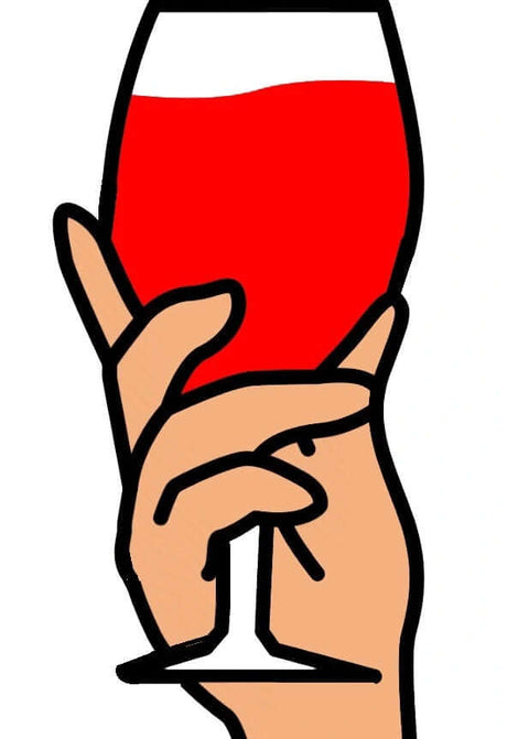 Hand holding a big wine glass filled with red drink, colorful prop for photo booths and events.