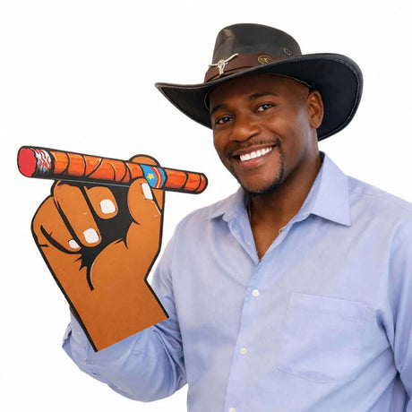 Big Hand Cigar prop held by a smiling man in a cowboy hat, perfect for photo booths and fun events.
