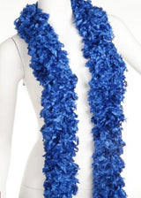 Featherless blue boa showcasing vibrant color and softness, perfect for any occasion, in a tule bag for easy storage.
