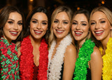 A 5 Piece Boa Bundle worn by five smiling women at a festive event, showcasing colorful boas in red, white, and green.