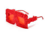 Red Furry Glasses – Fluffy square party sunglasses with bold red fur and fun orange lenses.