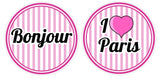 Colorful round Paris party props with 'Bonjour' and 'I ❤️ Paris' designs, perfect for vibrant celebrations.