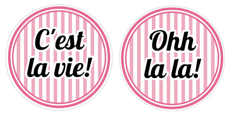 Paris Party Prop Set featuring colorful round signs with 'C'est la vie!' and 'Ohh la la!' phrases for vibrant celebrations.