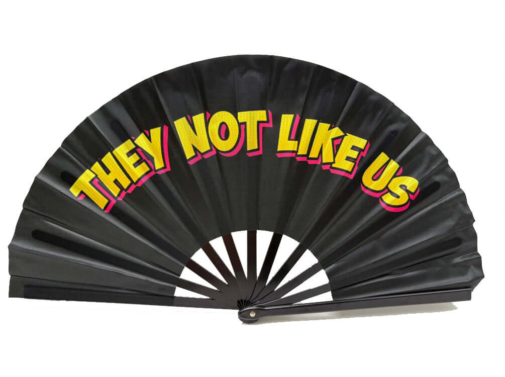 They Not Like Us Folding Fan for Photo Booth Party - colorful 13" fan prop for events and photo booths.