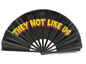 They Not Like Us Folding Fan for Photo Booth Party - colorful 13" fan prop for events and photo booths.